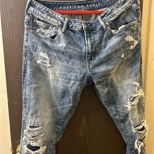 Ripped blue jeans American Eagle